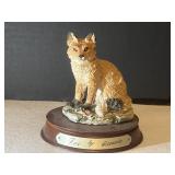 Fox Figurine on Wooden Stand by Leonardo