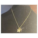 A gold Tone Necklace w/ 2 Pendants