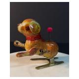 Vintage wind-up tin toy dog. "Jumping Dog"