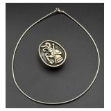 Silver necklace and box