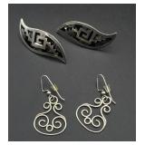 2 silver earrings