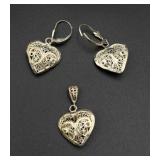 Silver earrings and pendant