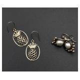 2 silver earrings