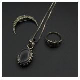 Silver necklace, brooch and ring
