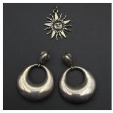 Silver earrings and pendant