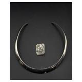 Silver necklace and brooch