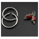 2 silver earrings