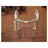 ADJUSTABLE HEIGHT FOLDING WALKER