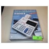 TEXAS INSTRUMENTS CALCULATOR - TURNS ON