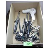 BLOW DRYER & CURLING IRONS (TURN ON)