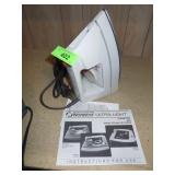 NORELCO STEAM / DRY IRON - TURNS ON