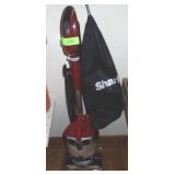 SHARK VACUUM CLEANER W/ ASST. ATTACHMENTS- TURNS >