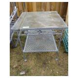 METAL TABLE WITH GLASS TOP & MESH SHELF (MATCHES>>