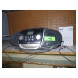 RCA AM/FM/CASSETTE/CD PLAYER (TURNS ON)