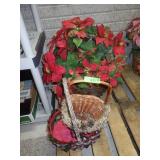 POINSETTIA ARRANGEMENT IN WICKER BASKET,>>