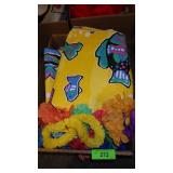 ASST VINYL TABLECOTHS & HAWAIIAN LEIS