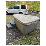 2 person hot tub with stairs and breaker box