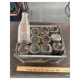 Richï¿½s milk bottles with crate