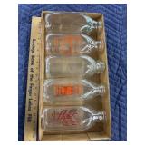 Milk bottles