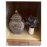 Covered jar and floral