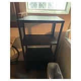 3 plastic shelfs contents not included