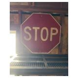 Stop sign being screw driver to remove