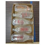 Milk bottles