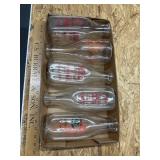 Milk bottles
