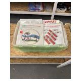 Tote full of needlepoints and misc