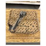 Case of black serving forks