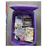 Disney and misc vhs in tote