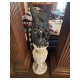 Iron owl and column