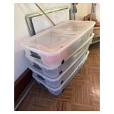 4 totes with clothing