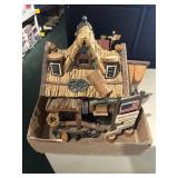 Wagon wheel bird house and lighthouse