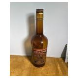 Large glass James e. Pepper bottle