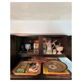 Contents of cabinet and top of fridge