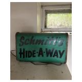 Schmitts hide a way sign