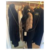 Furs , coats and contents of closet