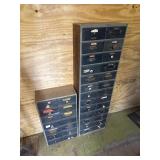 Wood drawer cabinets full of hardware