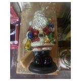 Large glass Santa Claus statue