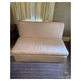 Loveseat converts to a bed