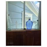 Bottles in windows