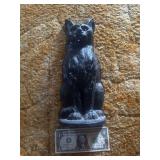 Iron cat doorstop