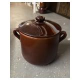 Pottery covered pot