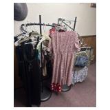 2 clothing racks with clothing
