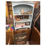 Blue shelf , cabinet , duck sign and misc