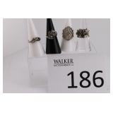 Four Sterling Silver Rings