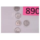 Eight Kennedy Half Dollars
