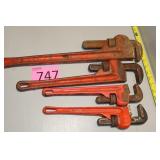 Four Adjustable Pipe Wrenches