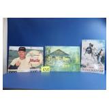 Three Metal Advertising Signs